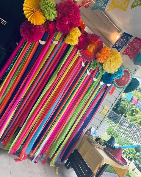 This is a handmade colourful backdrop used for a fiesta party. All the guests commented the decorations looked amazing 😍 Fiesta Streamer Backdrop, Fiesta Birthday Backdrop, Mexican Balloon Backdrop, Mexican Fiesta Party Ideas Decorations, Fiesta Backdrop Ideas, Fiesta Photo Backdrop, Fiesta Party Backdrop, Colourful Backdrop, Fiesta Photo Booth