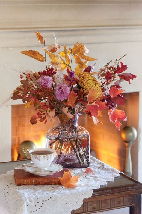 When the trees burst with vibrant leaves in an array of hues from gold to crimson, nature provides accents befitting the glory of the season. Our autumn arrangements, laden with colorful fruits and flowers, are destined to inspire. Fall Floral Centerpieces, Fall Centerpieces, Victoria Magazine, Autumn Tea, Fall Floral Arrangements, Deco Nature, Autumn Table, Pumpkin Colors, Fall Centerpiece