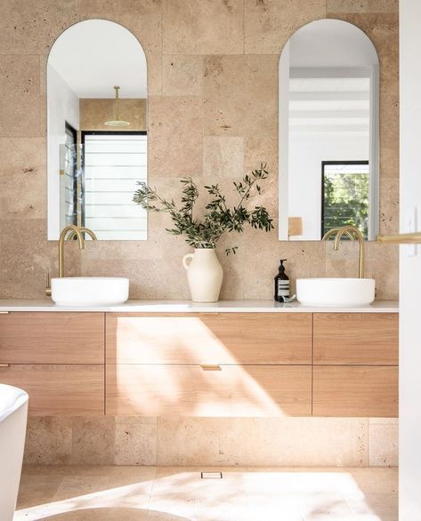 ABI Interiors on Instagram: “The best accessory in a home is natural light. ⁠⠀ ⁠⠀ It envelops the bathroom of @ema_harrison ⁠with an incredible radiance. But there's…” Travertine Bathroom, Mediterranean Bathroom, Mediterranean Interior, Coastal Bathrooms, Bathroom Design Inspiration, Bathroom Renos, Laundry In Bathroom, House Bathroom, Beautiful Bathrooms