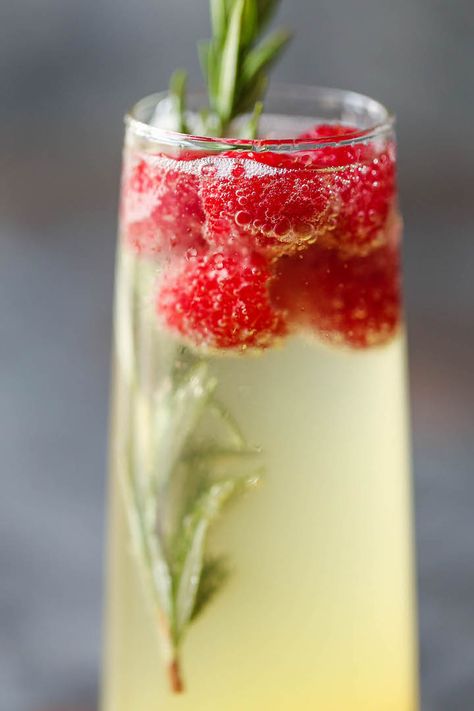 Champagne Punch - A festive cocktail for any occasion that's sure to impress! Unbelievably easy, fruity and refreshing! Can be made non-alcoholic as well. Champagne Punch Recipes, Pina Colada Cocktail, 21 Party, Champagne Recipes Cocktails, Champagne Punch, Champagne Drinks, Whiskey Cocktail, Vodka Cocktails Recipes, Festive Cocktails