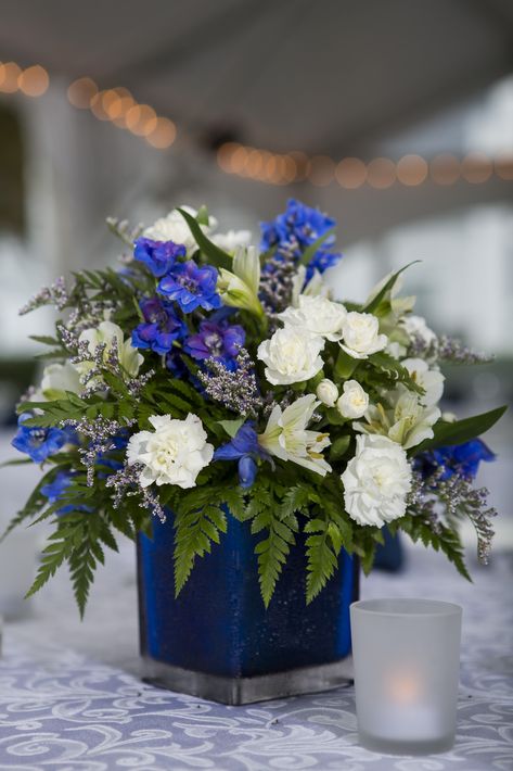 Blue White And Silver Floral Arrangements, Blue Gold White Floral Arrangements, Blue And Gold Flower Centerpieces, Blue White Floral Arrangements, Blue White And Gold Centerpieces, Blue And Silver Centerpieces Party Ideas, Royal Blue Flower Arrangements, Blue And Silver Table Decor, Blue Centerpieces For Party