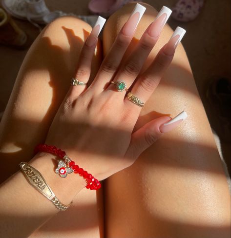 Long nails, white french tips Basic Frenchies Nails, Regular White French Tip Nails, Xl White French Tip Nails, French Tip Nail Art White, White French Tip With Red Bottoms, Xl Long French Tip Nails, White French Tip Nails With Red Gems, Long French Nails With Rhinestones, Curve French Tip Nails