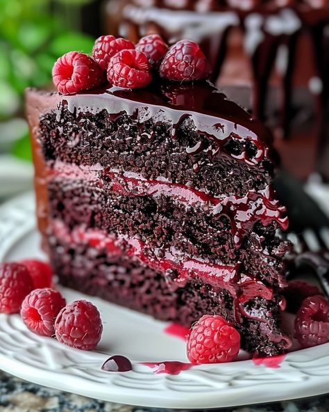 A luscious cake that combines the rich flavor of chocolate with the tanginess of raspberry. Perfect for celebrations or indulging in a delightful dessert, this cake features a moist chocolate sponge, raspberry filling, creamy frosting, and a decadent chocolate ganache drip. Visit website for full recipe at https://northeastnosh.com/f/chocolate-raspberry-cake #northeastnosh #chocolatecake #chocolatedessert #chocolate #chocolateraspberry #ganache #chocolateganache #darkchocolate #milkchocolat... Chocolate Raspberry Cake Recipe, Chocolate Ganache Drip, Raspberry Cake Recipes, Raspberry Ganache, Ganache Drip, Raspberry Torte, Raspberry Frosting, Creamy Frosting, Raspberry Desserts