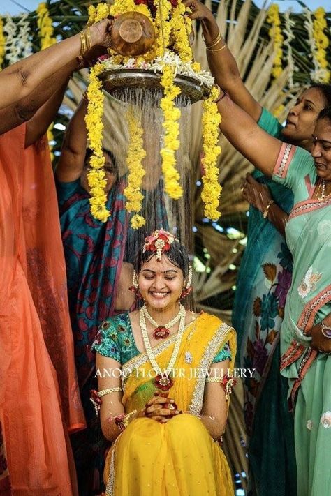 Haldi ceremony Haldi Ceremony Outfit South Indian, Haldi Water Splash, Mangalasnanam Outfit For Bride, Telugu Haldi Ceremony, South Indian Haldi Ceremony, Haldi Ceremony Outfit, Fresh Flower Jewelry, Haldi Function, Bridal Photography Poses