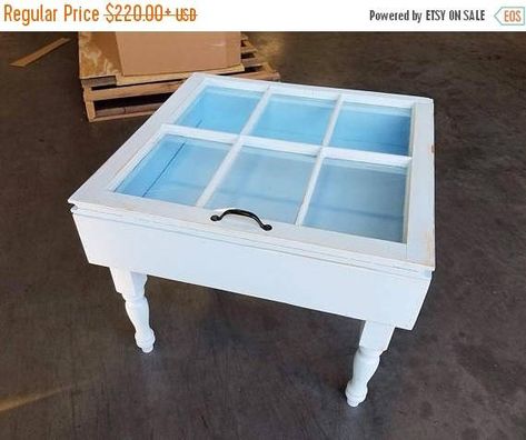 This beautiful farmhouse end table is made from a 6 pane wood window , painted in a light blue and distressed. We can paint or stain your table any color. These tables are fully customizable. What a wonderful Christmas gift this would make! This one measures approx 32x26 5 deep inside Glass Box Coffee Table, Beachy Glass Coffee Table, Glass Top Coastal Coffee Table, Build Glass Top Storage Coffee Table, Wooden End Tables, Replace Glass Coffee Table Top With Wood, Shadow Box Christmas, Old Wood Windows, Shadow Box Coffee Table