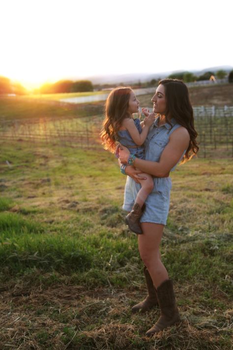 Rustic Mother Daughter (mommy/toddler) photoshoot with sunset, cowboy boots, and vineyard. Western Mother Daughter Pictures, Rustic Photoshoot, Sunset Cowboy, Cowboy Sunset, Mom Daughter Photos, Son Photoshoot, Mommy Daughter Photoshoot, Mommy Daughter Pictures, Daughter Pictures