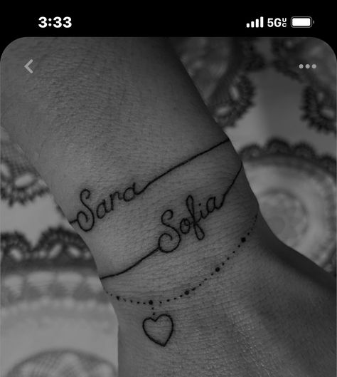 Name Tattoo Bracelet Wrist, Anklet Tattoos With Names, Tattoo Ideas With Childs Name, Tattoo Name Bracelet, Bracelet Tattoos For Women With Name, Tattoo For Daughter Name, Daughter Names Tattoo Ideas Mom, 2 Kids Names Tattoos For Women, Name Bracelet Tattoos For Women Wrist