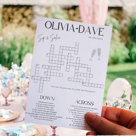 Custom Wedding Crossword Puzzle- Bridal Shower Sip and Solve Questions, Printable Engagement Guest Table Games, Editable Canva Template SEE SIMILAR ITEMS & DIFFERENT SIZES HERE: https://www.etsy.com/shop/DigitalCreationsByGG?ref=dashboard-header&search_query=crossword Make your wedding, bridal shower or engagement party unforgettable with our custom crossword puzzle! This unique and fun activity is perfect for entertaining your guests as they sip, solve, and celebrate your special day.  Features: - Interactive Entertainment: Keep your guests engaged with a delightful crossword puzzle filled with personalized questions about the bride and groom. - Perfect Size: The 5x7" size makes it easy to place at each guest's seat or display on a guest table. - Editable Template: Customize the questions Sip And Solve, Wedding Crossword Puzzle, Guest Table, Dashboard Header, Wedding 2025, Getting Engaged, Crossword Puzzle, Table Games, Printable Designs