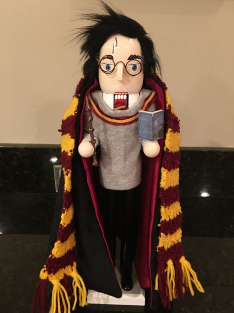 Our daughter loves Harry Potter & nutcrackers. I wanted to buy one but couldn’t find any. I saw a nutcracker in Michaels with white hair & glasses & modified him with a black hair, velvet cape, crocheted a scarf & made his sweater out of a sock. Harry Potter Nutcracker, Nutcracker Redo, Pirate Nutcracker, Halloween Nutcrackers, Unique Nutcrackers, Nutcracker Inspiration, Nutcracker Diy, Funny Nutcracker, Nutcracker Ideas