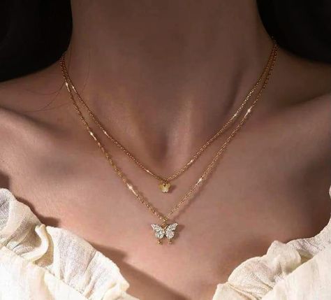 • Material: Alloy • Color: Gold Plated Chain • Pendant: Butterfly • Unique Korean Design • Keep Away From Dust And Moist • Double Chain Style • For Party Wear #aesthetic #ａｅｓｔｈｅｔｉｃ #jwellery #necklace #koreanjewelry #aestheticjewelry #elegantjewelry #HandcraftedJewels #JewelryObsession #JewelryInspiration #explorepage #pintrestjwellery #pintrestjwelleryvibes Korean Jwellery Aesthetic, Korean Chain Necklace, Korean Necklace Aesthetic, Korean Jwellery, Style For Party, Butterfly Unique, Budget Bridesmaid Dresses, Pendant Butterfly, Chains Aesthetic