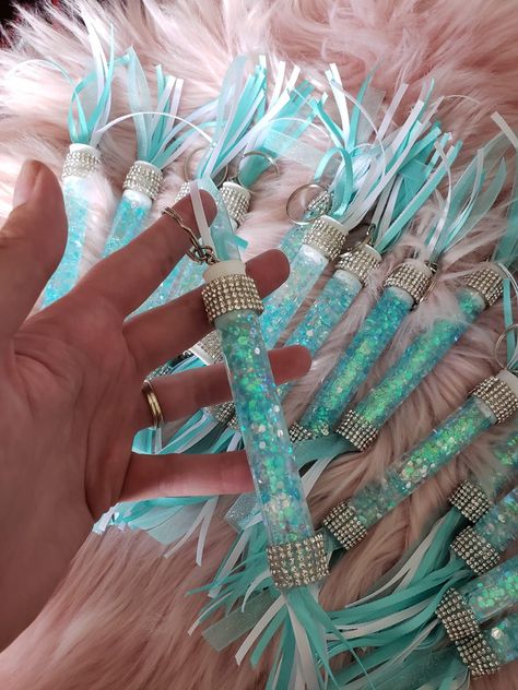 Mini Cheer Spirit Sticks, Cheer Team Gift Ideas Diy, Spirit Stick Keychains, Cheer Clothespins For Backpacks, Cheer Choreography Gifts, Cheerleader Clothes Pins, How To Make Spirit Sticks Cheer, Drill Team Gift Exchange Ideas, Cute Cheer Gifts Diy