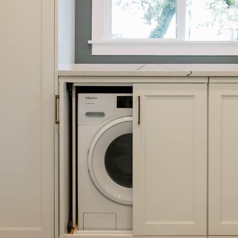 Hide your laundry appliances in a cabinet? This couple had not choice but to put their laundry in their kitchen. So we hid them in these pocket door cabinets so they would look like normal kitchen cabinets when closed. This washer/dryer combo is on the small side... about 3 cu ft instead of the 4 cu ft you get with full size machines. Hidden Laundry In Kitchen Cabinets, Hidden Laundry Table, Hidden Kitchen Laundry, Utility Room Hidden Washing Machine, Laundry Room In A Bathroom, Laundry Inside Kitchen, Washer Dryer Hidden In Cabinet, Washing Machine In Pantry, 6x10 Laundry Room