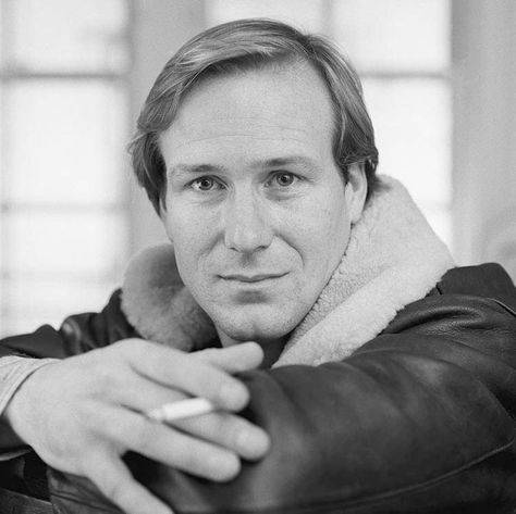 American actor William Hurt wearing a flying jacket and posing with a cigarette, early 1980s. William Hurt, Big Chill, Actors Male, Dark City, Actrices Hollywood, Jane Eyre, Love Hurts, Black And White Portraits, Hollywood Actor