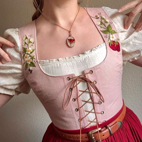 Walking Through Woodlands 🌿 | The Strawberry Corset Top 🍓*SOLD* This corset top is the perfect ode to one of spring's dearest delights: the humble but ever-lovely… | Instagram Ren Faire Outfits Cottagecore, Hobbitcore Accessories, Corset Outfit Cottagecore, Pink Ren Faire Outfit, Cottagecore Bodice, Renfaire Outfit Ideas, Ren Fair Outfits, Corset With Dress, Strawberry Corset