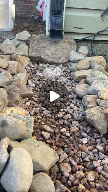 Rock Pond Landscaping, Landscape River Rock Ideas, Rock Gutter Drainage Ideas, River Rock Downspout Drainage, Small River Rock Landscaping, Rocks Around Foundation Of House, Garden In Mountains, Dry Stream Bed Drainage, Front Yard River Rock Landscaping