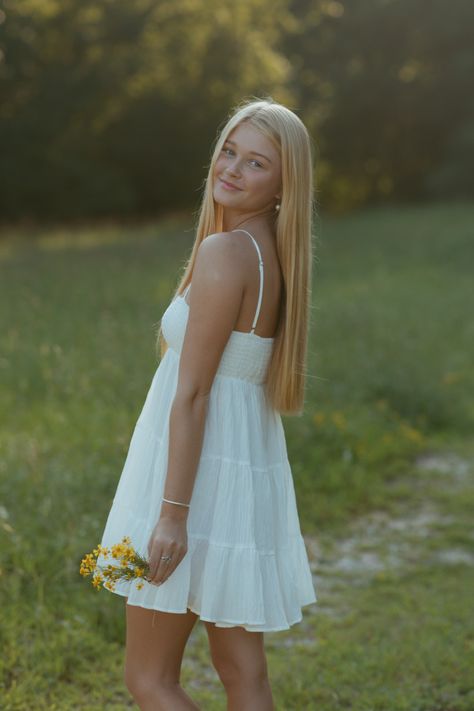 White Dress Flowers Sunny Field Senior Outfit Inspo Golden Hour North GA Photographer Senior Pic Inspo Sundress Senior Pictures, Senior Photo White Dress, Short Dress Senior Pictures, Short White Dress Senior Pictures, White Dress For Senior Pictures, White Dress Senior Pics, Summer Senior Pictures Outfits Dresses, Senior Picture White Dress, Senior Picture Ideas White Dress