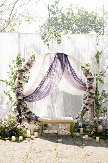 Purple And Lavender Wedding Decorations, Purple Pastel Wedding Theme, Lilac Engagement Decor, Lavender And Gold Wedding Decorations, Beige And Lavender Wedding, Purple Flower Arch Wedding, Round Wedding Arch With Flowers, Dusty Purple Wedding Decor, Lavender Engagement Decor