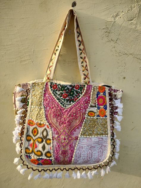 Beautiful handmade patchwork shoulder tote bags for all hand made lovers this look classy and unique becuase of its work Hippie style bag made by the artisan of tribble rajasthan people Bag Detail - Length - 15 inch Width - 18 inch Strap - 12 inch Fabric - Cotton with embroidered patches Patchwork Tote Bags, Handmade Fabric Bags, Boho Patchwork, Diy Bag Designs, Bag Designs, Fabric Ideas, Look Classy, Bags Vintage, Boho Bags