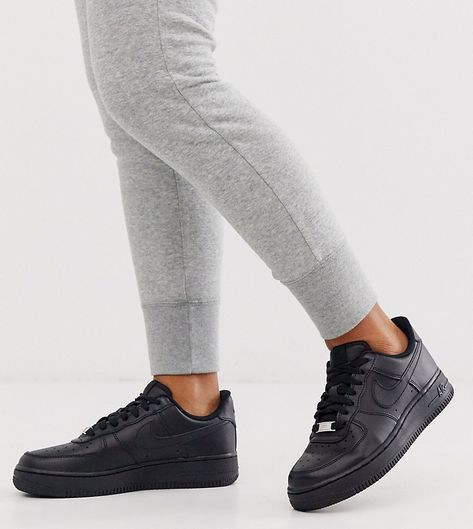 NIKE NIKE TRIPLE BLACK AIR FORCE 1 '07 SNEAKERS. #nike #shoes Airforce 1 Outfit Women, Nike Air Force Black, Nike Air Force Low, Black Air Force 1, Nike Air Max Jordan, Nike Air Force Ones, White Trainers, Trending Sneakers, Triple Black