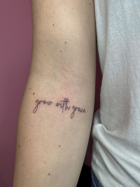 Grow with grace, fineline tattoo, tattoo quote. Single needle tattoo Bloom And Grow Tattoo, Give Yourself Grace Quote Tattoo, Grow With Grace Tattoo, Grow In Grace Tattoo, Bloom With Grace Tattoo, Grace Tattoos For Women, Skin Doodles, Grace Tattoo, Piercings Aesthetic