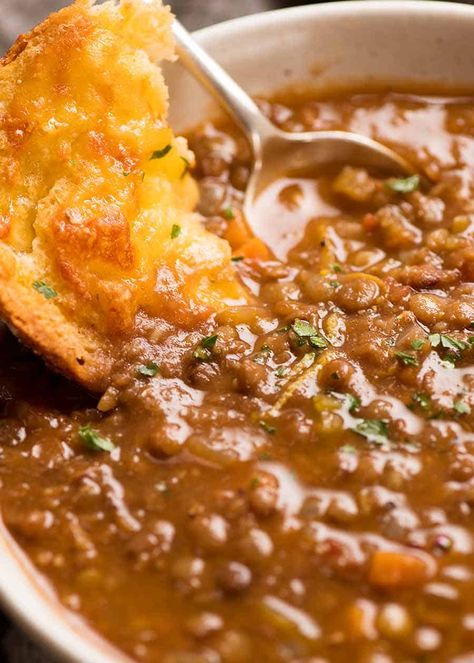 Close up of cheesy garlic bread being dunked into Lentil Soup Keto Lentil Soup Recipes, Progresso Lentil Soup Copycat, Lentil Recipes Soup, Lentil Soup Recipe, Recipetin Eats, Recipe Tin, Lentil Soup Recipes, Cheesy Garlic Bread, Soup And Stew