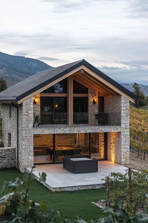 Modern French chalet house facade with geometric stone ground floor and timber chalet second floor provencal vineyard in the background. Check out all of these charming French chalet house exteriors that perfectly blend rustic elegance and cozy, alpine vibes. French Vineyard House, Timber And Stone Houses, Stone And Timber House, Rustic Modern Home Exterior, Modern Chalet Exterior, Modern Old House, Small Chalet Design, Modern Houses Exteriors, Modern Architecture House Exterior