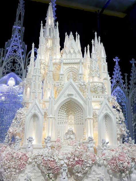 This elaborate and intricate wedding cake looks as if it has been inspired by a cathedral,... Castle Wedding Cake, Crazy Wedding Cakes, Extravagant Wedding Cakes, Big Wedding Cakes, Extravagant Wedding, Castle Cake, Amazing Wedding Cakes, Crazy Cakes, Fondant Icing