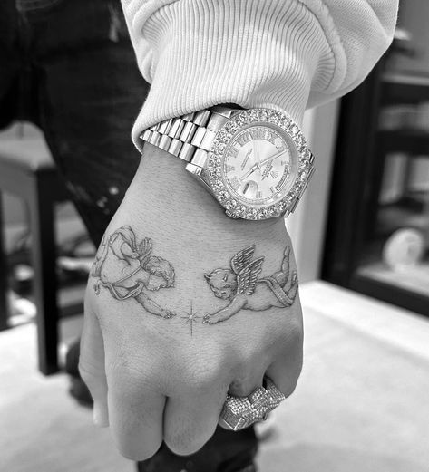 Two Angels Tattoo Men, 4in Tattoos, 2 Piece Tattoo, Good Angel Bad Angel Tattoo Ideas, Cloud And Angel Tattoo, Angel Tattoo On Hip, Angels Touching Hands Tattoo, 1x1 Tattoo Ideas For Women, Angel Reaching Out Tattoo