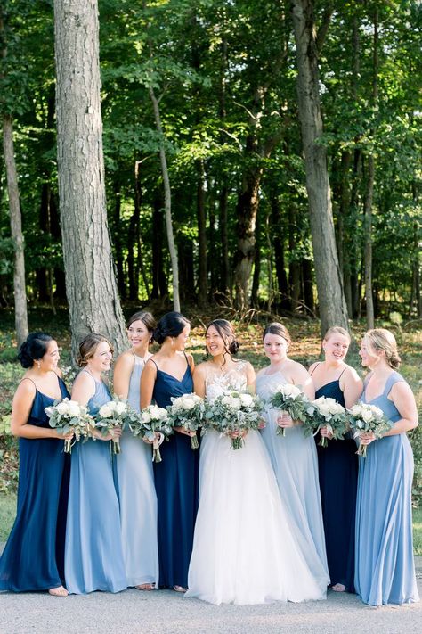 Bride with her Bridemaids dressed in different shades of blue Blue Themed Wedding Dress, Blue Dresses For Bridesmaid, Saphire Dresses Bridesmaid, Blue Shades Dress, Bridesmaids Dresses Navy Blue, Brides Made Dresses Blue, Bridesmaids In Shades Of Blue, Bestmaids Dresses, Bridemades Dresses Blue