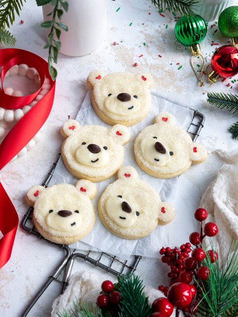 These adorable polar bear cookies are incredibly soft and chewy and are topped with the most delicious homemade buttercream frosting. Chelsweets Christmas Cookies, Polar Bear Christmas Cookies, Cute Desserts Christmas, Cute Christmas Cookies For Kids, Cute Christmas Cookie Recipes, Polar Bear Desserts, Good Christmas Cookie Recipes, Kids Holiday Cookies, Christmas Sweets For Kids