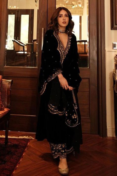 Buy #black #kurta with zardozi embroidery on the neckline and sleeve hems by #SureenaChowdhri at #AzaFashions Shop online now at #Azafashions.com Call +12132135273 or email contactus@azafashions.com for enquiries. #wedding #festive #ethnic #tradional #shopping #shoponline #party #reception #bride Velvet Suits Women Indian, Sureena Chowdhri, Embroidery Zardozi, Black Velvet Suit, Suits For Women Indian, Velvet Suit Design, Kurta Palazzo Set, Velvet Embroidery, Velvet Dress Designs