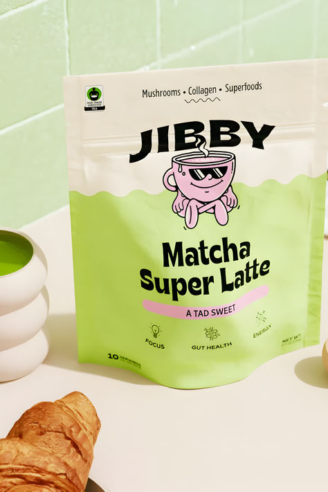 Boost focus, energy, and mood with organic matcha infused with superfoods and mushrooms. A delicious, low-caffeine coffee alternative ideal for everyday wellness. Check out the goodness of Jibby Coffee on Marmalade – your guide to mindful sips and vibrant mornings. Transform your Breakfast Nook into a haven of health. #MatchaLatte #Superfoods #BreakfastNookIdeas #JibbyCoffeeOnMarmalade #WellnessDrink #OrganicMatcha #LowCaffeine #HealthyLiving #MoodBoost #EverydayWellness 🌿✨📌 Mushroom Package Design, Specialty Coffee Packaging, Matcha Branding Design, Health Food Branding, Matcha Packaging Design, Superfood Packaging, Matcha Packaging, Catering Branding, Matcha Branding