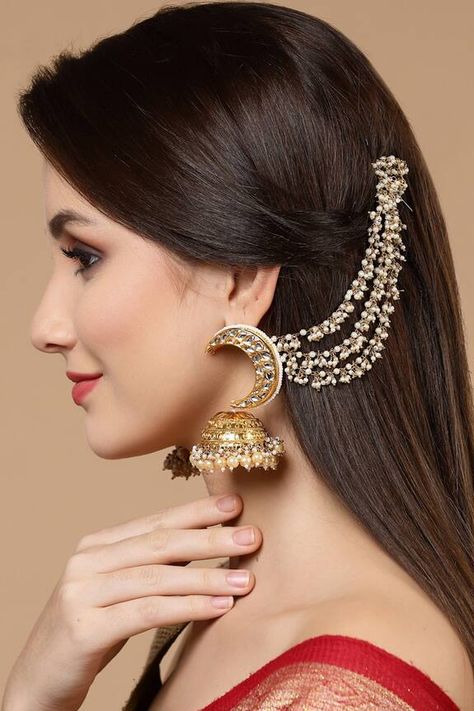 Gold plated jhumkas with white, cream kundan, pearl and natural stones embellishment. Component: 1 Pair Earring, 1 Pair Kanchain Type: Kundan, Pearl, Stone Composition: Metal Color: Gold,White,Cream Other Details:  Pearl drops Chain jhumkas Size (L x W):   Earring: 8 x 6 Kanchain: 15 x 2 Weight (in gms): 197  - Aza Fashions Luxury Round Kundan Jhumkas, Pearl Tassel Earrings Gold Indian, Luxury Gold Pearl Earrings With Latkans, Luxury Kundan Round Jhumkas, Sahara Jhumka Hairstyle, Ear Chain Hairstyle, Bahubali Earrings Hairstyle, Jhumka With Ear Chain Hairstyle, Hairstyles With Sahara Earrings