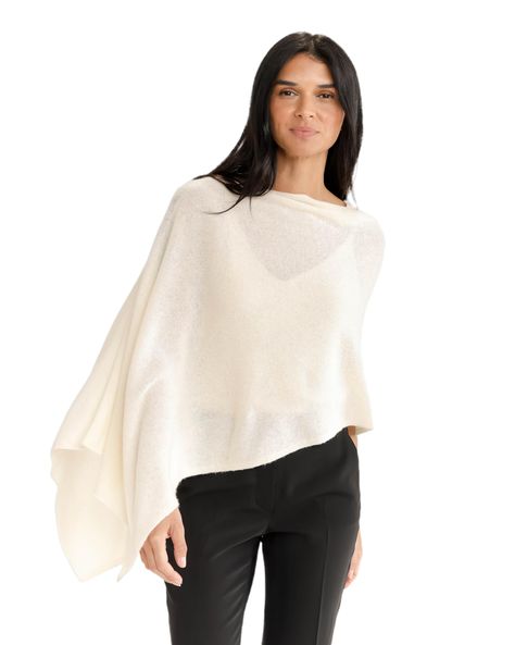 PRICES MAY VARY. Ultimate Luxury: Indulge in ultimate luxury with our large cashmere poncho wraps for women. Made from 100% super fine Inner Mongolian cashmere, this soft and warm garment is the perfect gift for anyone who loves the finer things in life. With a versatile design that covers your arms , this poncho is similar to ruanas and better than Shawl, elevating the look and style of any outfit. Rainbow of Colors: The poncho is available in a rainbow of colors, with over 60 shades to choose Poncho Shawl Outfit, Scandinavian Shawl, Note Highlighting, Cashmere Poncho Outfit, Poncho Outfits For Women, Sweater Poncho Outfit, Shawl Outfits, Cashmere Clothes, Wrap Outfit