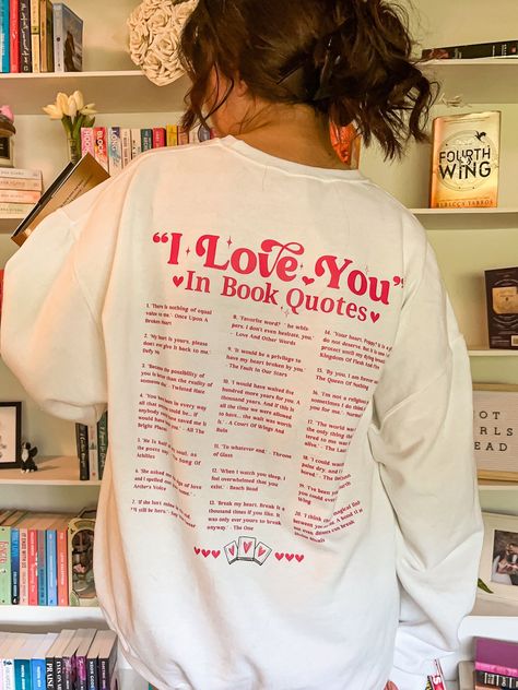 Show your love for books with this cozy sweatshirt or tee featuring a heart made of book quotes! #booklovergifts #bookquotes . #Quotes_Sweatshirt #Sweatshirts_Quotes #Graphic_Quotes #Book_Stuff Booktok Sweatshirts, Christmas Aesthetic Gifts, Booktok Merch, Bookish Tshirt, Quotes Sweatshirt, Tshirt Prints, Bookish Quotes, Books Stickers, Sweatshirt Ideas