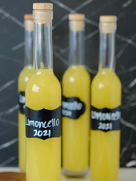 The BEST Homemade Limoncello - Foodology Geek Easy Limoncello Recipe, Home Made Lemon Cello, Lemoncello Recipes Homemade, Homemade Limoncello Italian, Home Made Limoncello, Lemon Liqueur Recipe, Lemon Chelo Limoncello Recipe, Diy Limoncello Recipe, Quick Limoncello Recipe