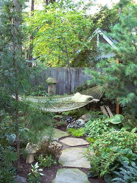 making your entire yard a private paradise, take one corner and transform it into a secluded getaway. A redbud just behind the hammock enhances the effect. Backyard Hammock, Outdoor Hammock, Landscape Projects, Garden Cottage, Garden Spaces, Shade Garden, Garden Paths, Dream Garden, Garden Room