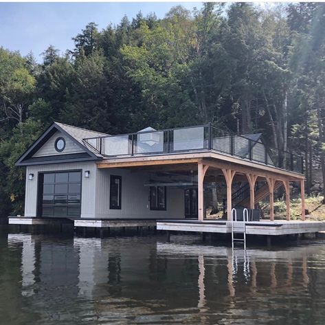 Lake Boat House Ideas, Lake House Boat Aesthetic, Luxury Boat Dock, Lake House Hot Tub, Floating Boat House, Unique Lake House Ideas, Lake Property Ideas, Boat House Exterior, Boat House Ideas Lakes