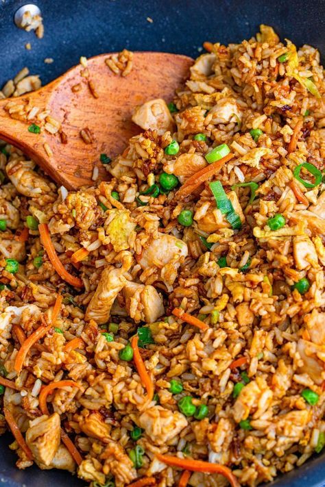 Learn how to make restaurant-quality chicken fried rice at home with just a few simple everyday ingredients. Tender chicken in each bite paired with fried rice, veggies, and tender eggs all seasoned perfectly. This easy chicken fried rice will instantly become a family favorite that even picky eaters will gobble up. Try this recipe for an easy weeknight lunch or dinner. Try it today! Chicken And Prawn Fried Rice, Homemade Chicken Fried Rice, Rice Ideas, Chicken Fried Rice Recipe Easy, Chicken Fried Rice Easy, Beef Fried Rice, Fried Rice Recipe Easy, Fried Rice With Egg, Chicken Rice Recipes