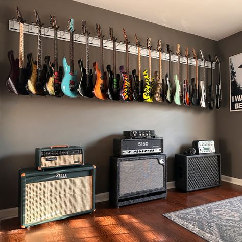 Guitar Display Ideas, Hanging Guitars On Wall Ideas, Guitar Room Man Cave, Guitars On Wall, Guitar Room Ideas, Musician Bedroom, Guitar Wall Display, Guitar Hanging Ideas, Guitar Display Wall