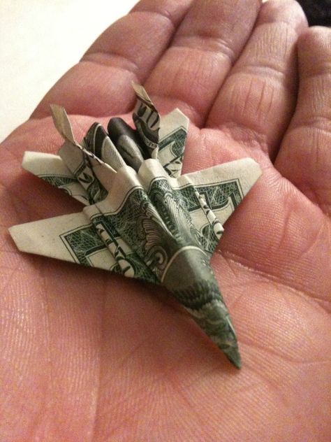 Paper Airplane - also perfect for presents  http://origami.wonderhowto.com/how-to/fold-origami-f-18-fighter-jet-out-dollar-bill-313882/ Jet Origami, Money Origami Tutorial, Origami Dollar, Origami Plane, Folding Money, Jet Airplane, Dollar Origami, Dollar Bill Origami, Creative Money Gifts