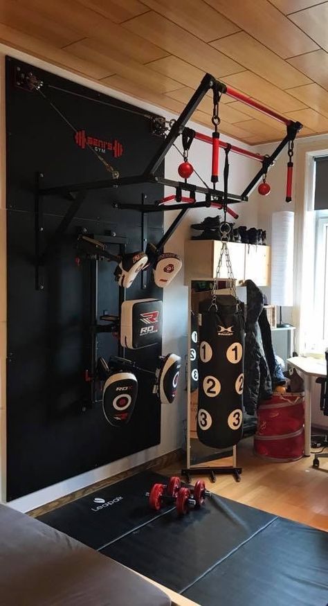 “A Home gym is the best way to save money. Take a look at the top home gym ideas from those of us who have been there and know what works!”  For your boxing/MMA equipment, gears and apparel needs, visit proboxing.com. Gym Room Ideas, Workout Room Decor, Home Gym Basement, Workout Room Home, Home Gym Garage, Trening Sztuk Walki, Mma Gym, Diy Gym, Diy Home Gym