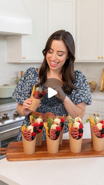 Carolina de Mauro on Instagram: "CHARCUTERIE CUPS ✨ your next party appetizer!  These cups are so cute and this is the easiest and most beautiful snack for your event. You can create them with whatever ingredients you prefer, but for ours we used:  - Trader Joe’s Fig & Olive Crackers - Salami - Babybel Cheese + Cherry Tomatoes - Trader Joe’s Peanut Butter Dark Chocolate Cups - Berries - Cheesesticks - Rosemary to decorate  Comment LINKS and I’ll DM the links to shop everything we used!  #founditonamazon #charcuterieboard #easyappetizers #appetizers #fallrecipes #entertainingathome #entertainingideas #entertaininginstyle #fallrecipe #bridalshowerideas #Itkhome #babyshoweridea #charcuteriecups #amazonfinds #amazonmusthaves #theeverygirlathome #snackboard #creativerecipes #pinterestinspired" Babybel Cheese Charcuterie, Make Your Own Charcuterie Cups, Christmas Charcuterie Cups Ideas, Salami Cups Appetizers, Make Ahead Charcuterie Cups, Breakfast Charcuterie Cups, Charcuterie In A Cup, Charcuterie Cups Diy, Charcuterie Party Cups