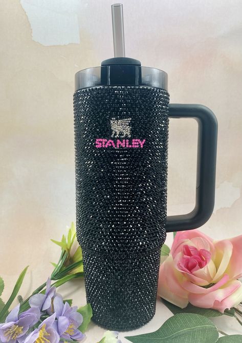 You Deserve This. Treat yourself with a luxury one of a kind 100% Genuine Swarovski & KiraKira Crystal cup/tumbler by CindyLouDesignsCo.  Stainless steel cup keeps your drinks hot or cold for hours. With proper care and use, these tumblers will last a lifetime. DO NOT SOAK AND HAND WASH ONLY. DO NOT SCRUB OUTSIDE OF CUP WITH ABRASIVE SPONGE. Item is final sale only, no returns on Made to Order items. No cancellations once order has been placed. Seller not responsible for shipping delays by carrier. Please be sure the shipping address associated with your Etsy account is correct before purchasing. I am not responsible for any lost/missing packages due to an incorrect shipping address. If your purchase gets returned back to us for insufficient address, you will be charged for return shipping Stanley Cup Bling, Bedazzled Stanley Cup, Bedazzled Stanley, Rhinestone Stanley Cup, Rhinestone Stanley Tumbler, Rhinestone Filled Tumbler, Fancy Cup, Trendy Water Bottles, Rhinestone Cups