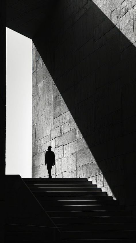 Silhouette person architecture monochrome staircase. | premium image by rawpixel.com / Chaiwoot Pooh Iphone Wallpaper Aesthetic Black White, Monochrome Staircase, Geometrical Animals, Light And Shadow Architecture, Person Architecture, Federer Style, Elevated Minimalism, Shadow Architecture, High Contrast Photos