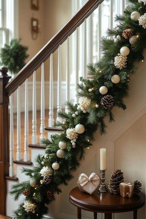 Transform your staircase with this stunning Christmas home decor! Lush greenery and chic ornaments create a cozy holiday vibe. Perfect for adding warmth to your space. #ChristmasHomeDecor #HolidayVibes #FestiveStaircase Stair Wreaths, Christmas Ideas For Stairs, Staircase Xmas Decor, Winter Staircase Decor, Stairway Swag, Window Decorations For Christmas, Christmas Decor Stairway, Christmas Staircase Garland Ideas, Staircase Decor Christmas