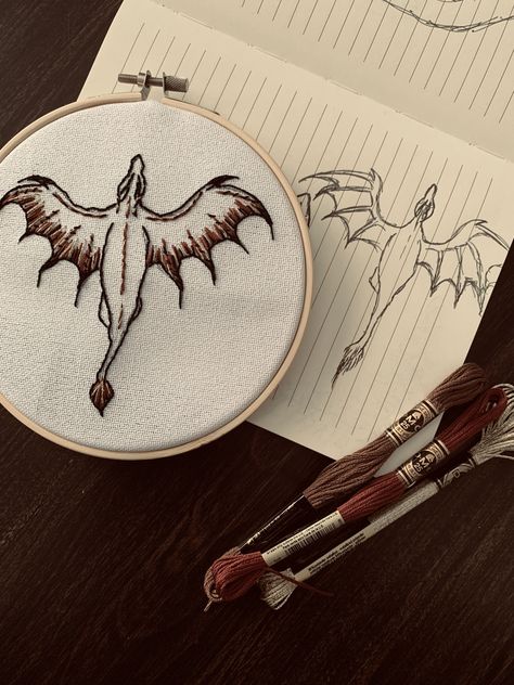 Fantasy embroidery🍄✨🐉🔮 #dragon #fantasy #embroidery Embroidery Stitch Types, Embroidery Fantasy Design, Dragon Embroidery Simple, Dnd Embroidery Pattern, Targaryen Embroidery, Dnd Embroidery, Embroider Bag, Alt Embroidery, Dragon Embroidery Pattern