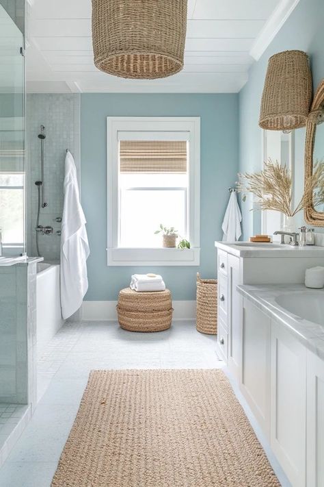 "Elevate your home with the charm of a Modern Coastal Bathroom! 🚿🌊 Perfect for those who love a fresh and relaxed aesthetic. 🌟✨ #BeachHouseDecor #ModernLiving #BathroomDesign" Hamptons House Bathroom, Cozy Coastal Bathroom, Coastal Grandmother Aesthetic Bathroom, Beach Bathroom Aesthetic, Costal Theme House, White Bathroom Blue Accents, California Coastal Bathroom Design, Beachy Bathroom Aesthetic, Coastal Beach House Bathroom