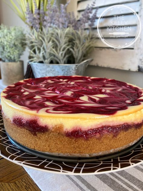 Raspberry Swirl Cheesecake - The Kelly Kitchen Rasberry Cheesecake, Raspberry Puree, Raspberry Swirl Cheesecake, Swirl Cheesecake, Cheesecake Recipes Classic, Raspberry Cheesecake, Sweets Treats, Cheesecake Recipes, Sweet Recipes