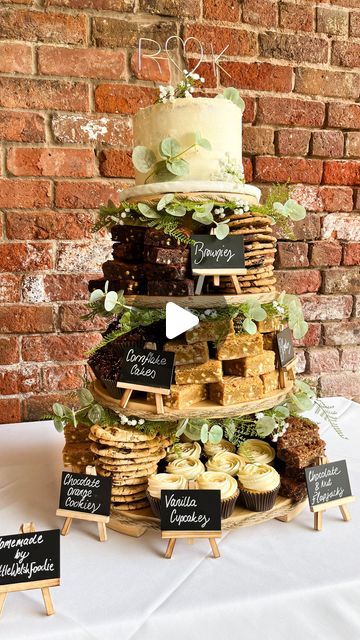 Naomi Spaven on Instagram: "Kate & Ricky’s Wedding Cake Tower 🫶🏼  Making these wedding cakes is possibly my favourite thing that has come from Little Welsh Foodie🥹  Getting to chat with the couples before hand and discuss what bakes and flavours are their favourite, right through to sitting with my dad sticking rope and leaves to the stand…I just love the whole process🫶🏼  Kate & Ricky had a beautiful wedding and I was so grateful to not only provide the cake, but also spend the evening at the wedding, chatting with people about the bakes and watching people demolish it😂  ON THE STAND: 🍰 3 Layer Victoria Sponge Cake 🍪 Vegan Chocolate Orange Cookies 🌾 Gluten + Dairy Free Choc Nut Flapjacks ✨ Cornflake Cakes (personal fave) 🍫 Triple Chocolate Brownies 🤍 White Chocolate Blondies 🧁 Wedding Cake With Cookie Tiers, Welsh Cake Wedding Cake, Chocolate Brownie Wedding Cake, Wedding Cake Dessert Ideas, Wedding Cake At Home, Wedding Cake With Brownies, Wedding Cake And Brownies, Wedding Brownie Cake, Coffee Cake Wedding Cake